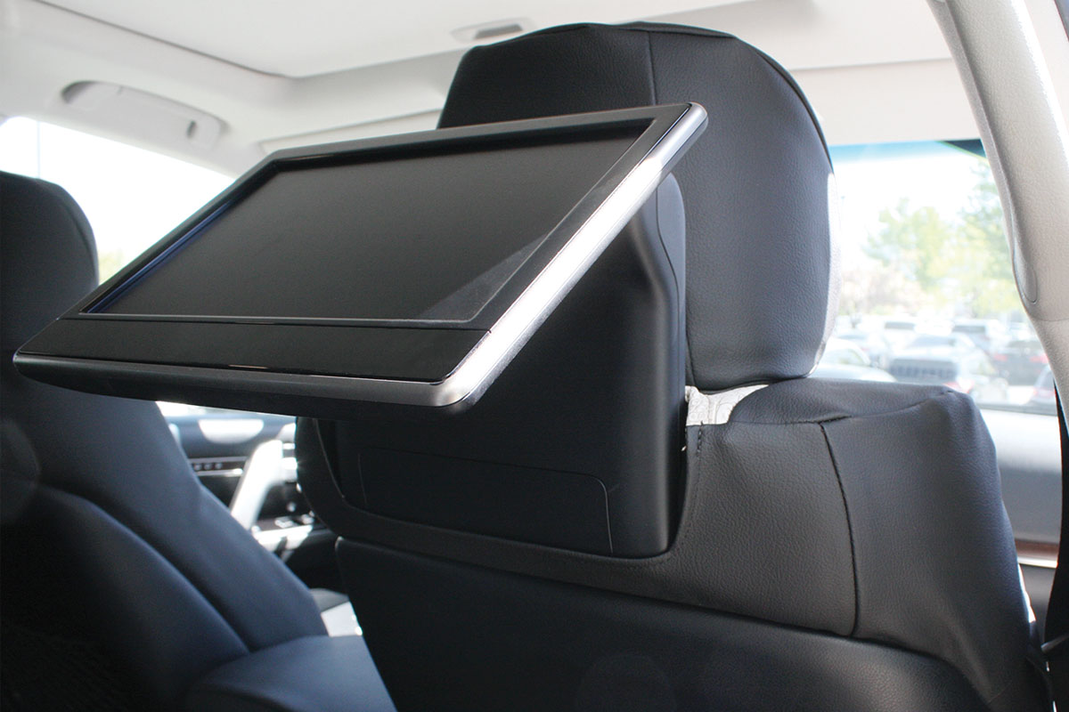 DVD screen accessible through custom seat covers