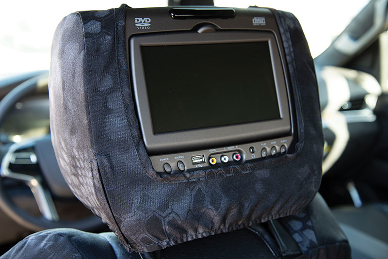 video display in headrest with custom seat covers
